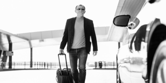 Man with trolley at airport